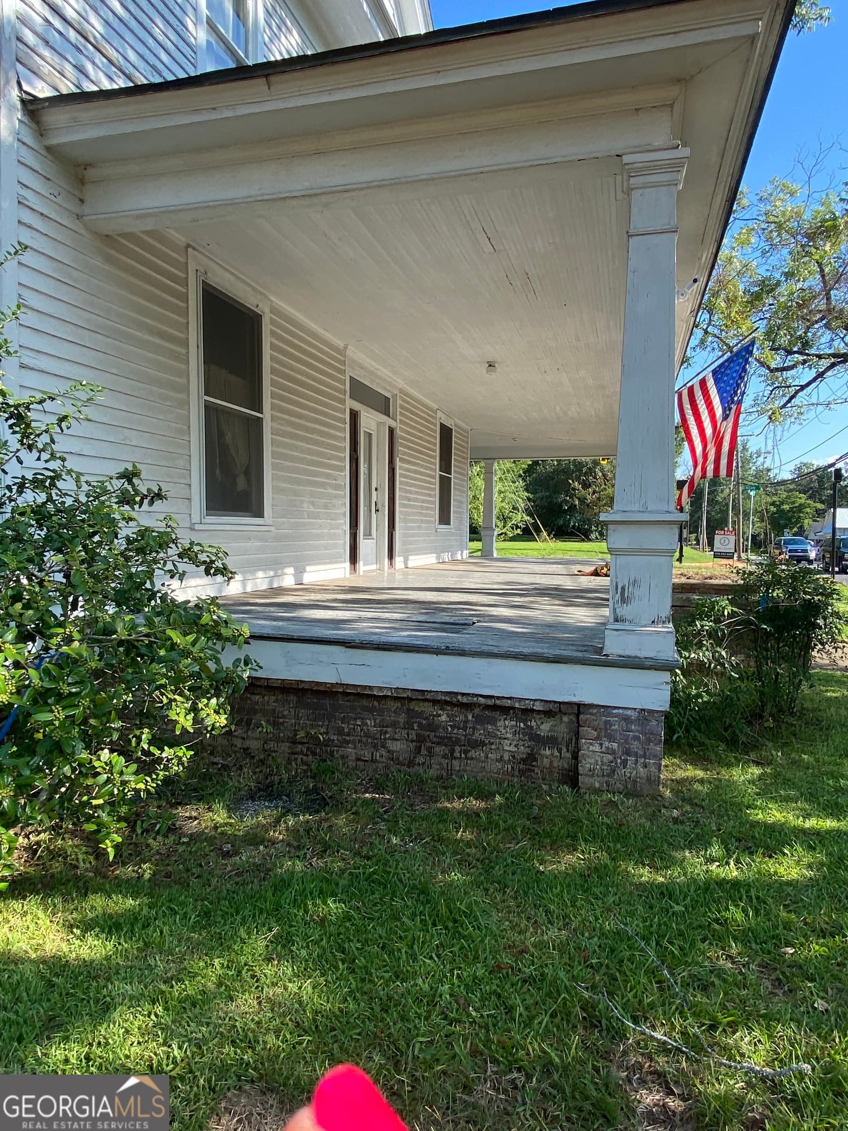 7 bedroom, 5 bathroom, 4,096 sq ft single family residence for sale at 302 N Harris Street, Sandersville, GA 31082 — photo 3