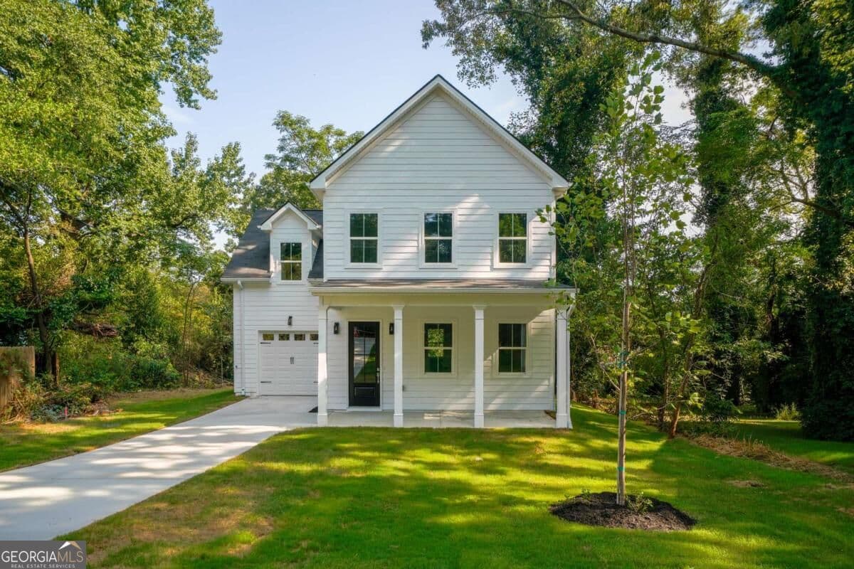 4 bedroom, 3 bathroom, 1,752 sq ft single family residence for sale at 3257 Gifford Street, Scottdale, GA 30079 — photo 2