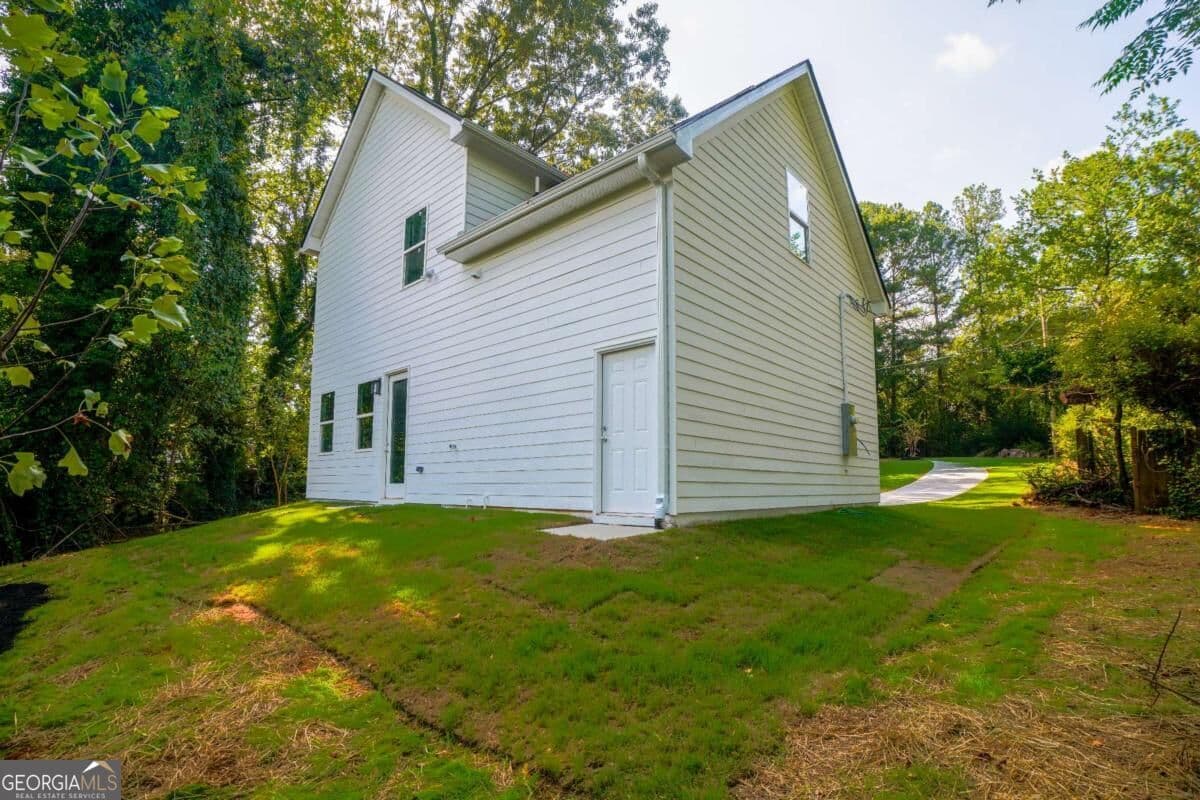 4 bedroom, 3 bathroom, 1,752 sq ft single family residence for sale at 3257 Gifford Street, Scottdale, GA 30079 — photo 3