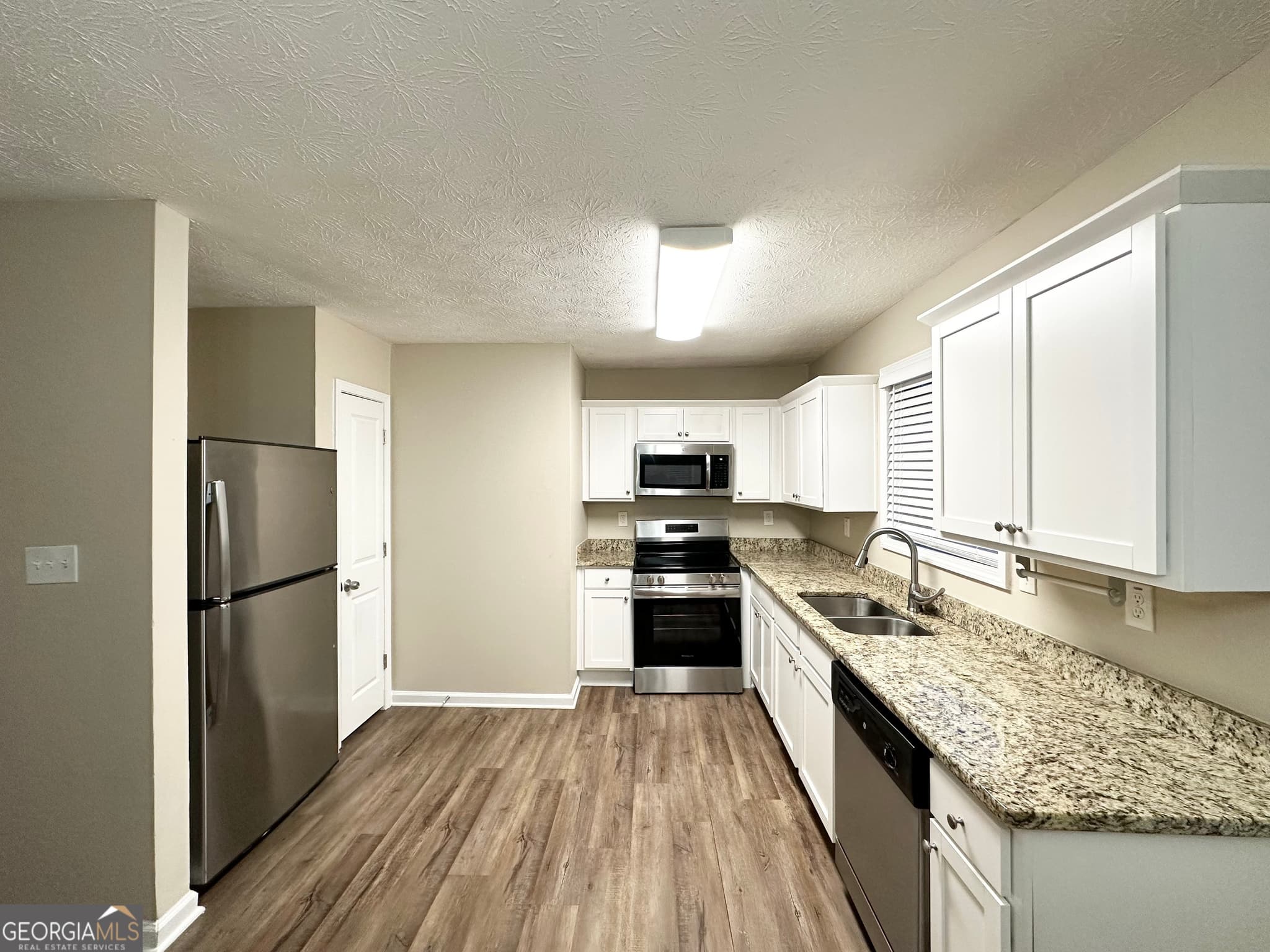 3 bedroom, 2 bathroom, 1,392 sq ft single family residence for sale at 5468 Pepperwood Court, Stone Mountain, GA 30087 — photo 5