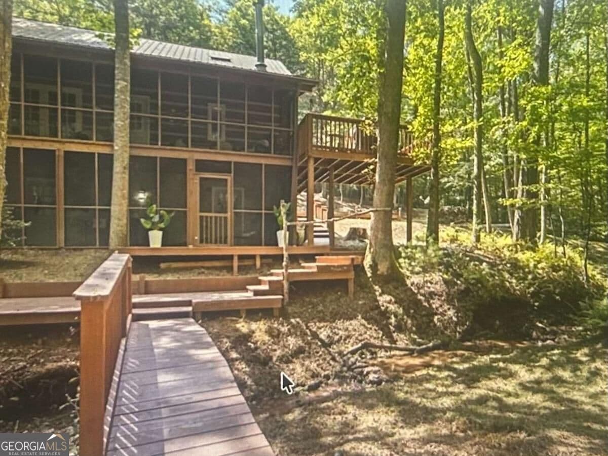 3 bedroom, 2 bathroom, 2,535 sq ft cabin,loft,single family residence for sale at 136 Honeysuckle Way 20, Blue Ridge, GA 30513 — photo 2