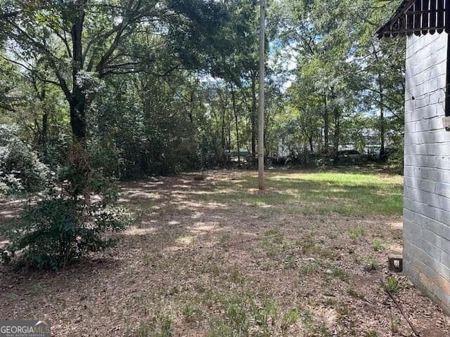 3 bedroom, 2 bathroom, 1,220 sq ft single family residence for sale at 402 Atlanta Street, Barnesville, GA 30204 — photo 4