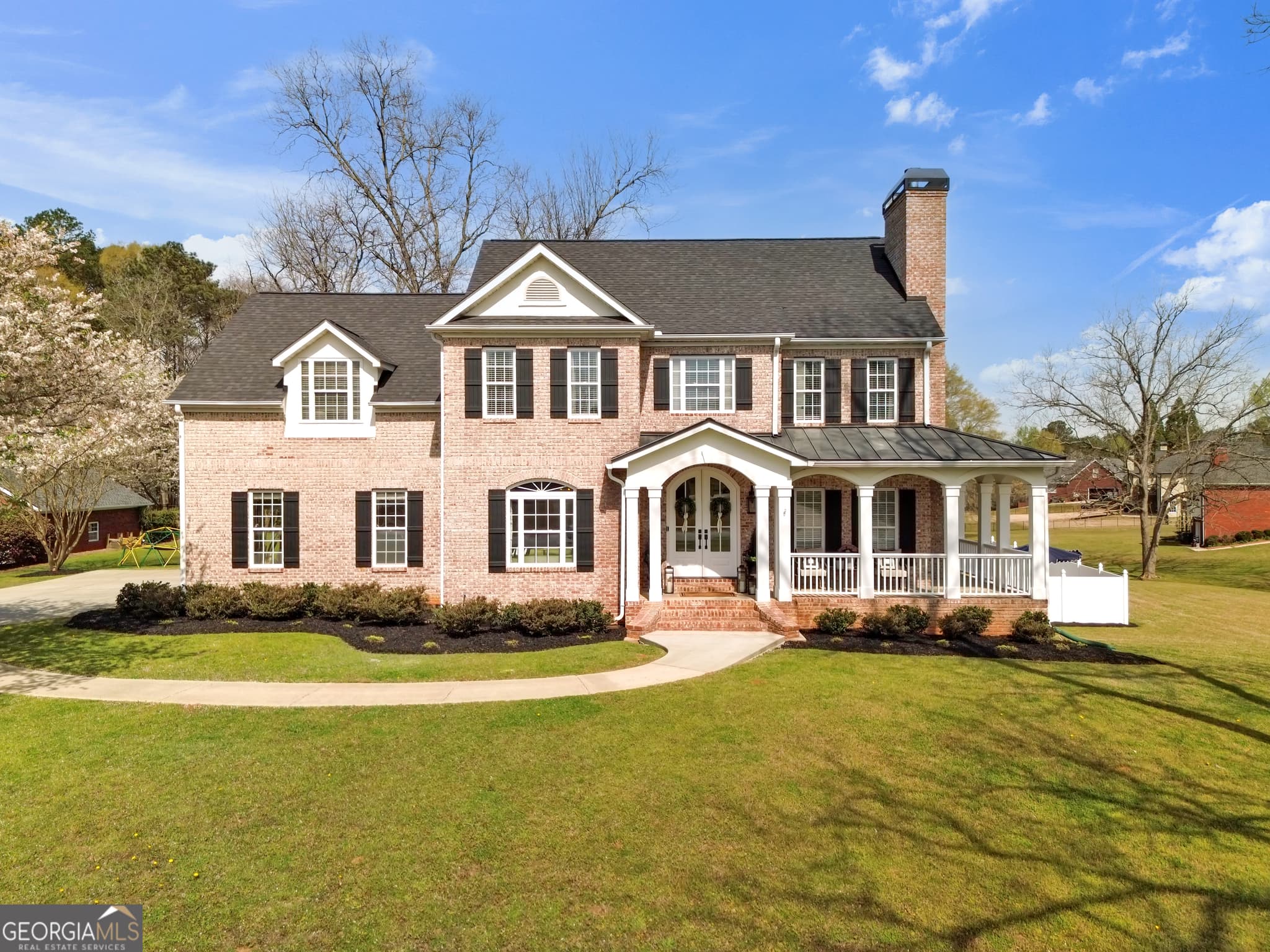 6 bedroom, 5 bathroom, 4,752 sq ft single family residence for sale at 120 Lake Park Drive, Sharpsburg, GA 30277 — photo 2