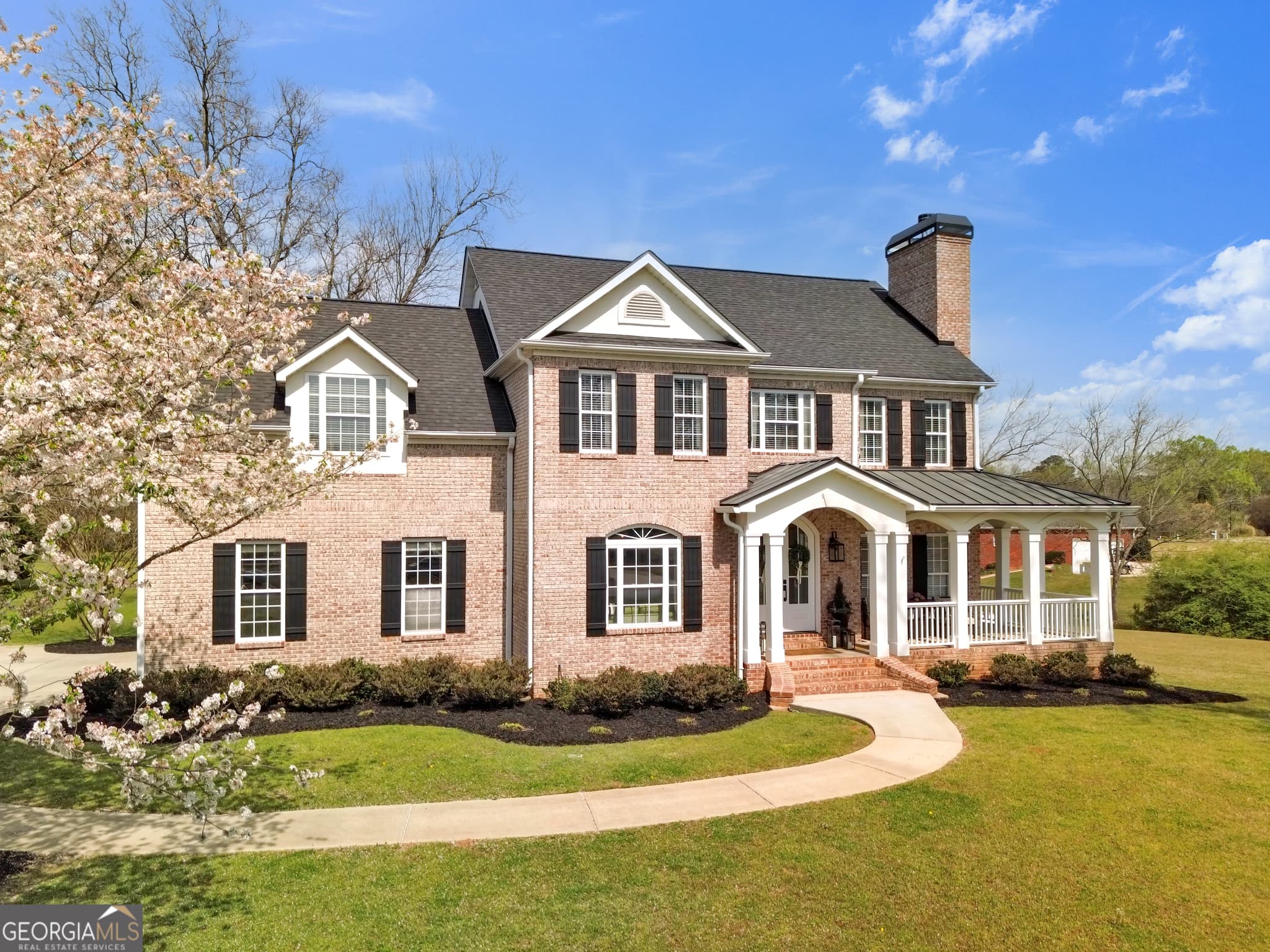 6 bedroom, 5 bathroom, 4,752 sq ft single family residence for sale at 120 Lake Park Drive, Sharpsburg, GA 30277 — photo 3