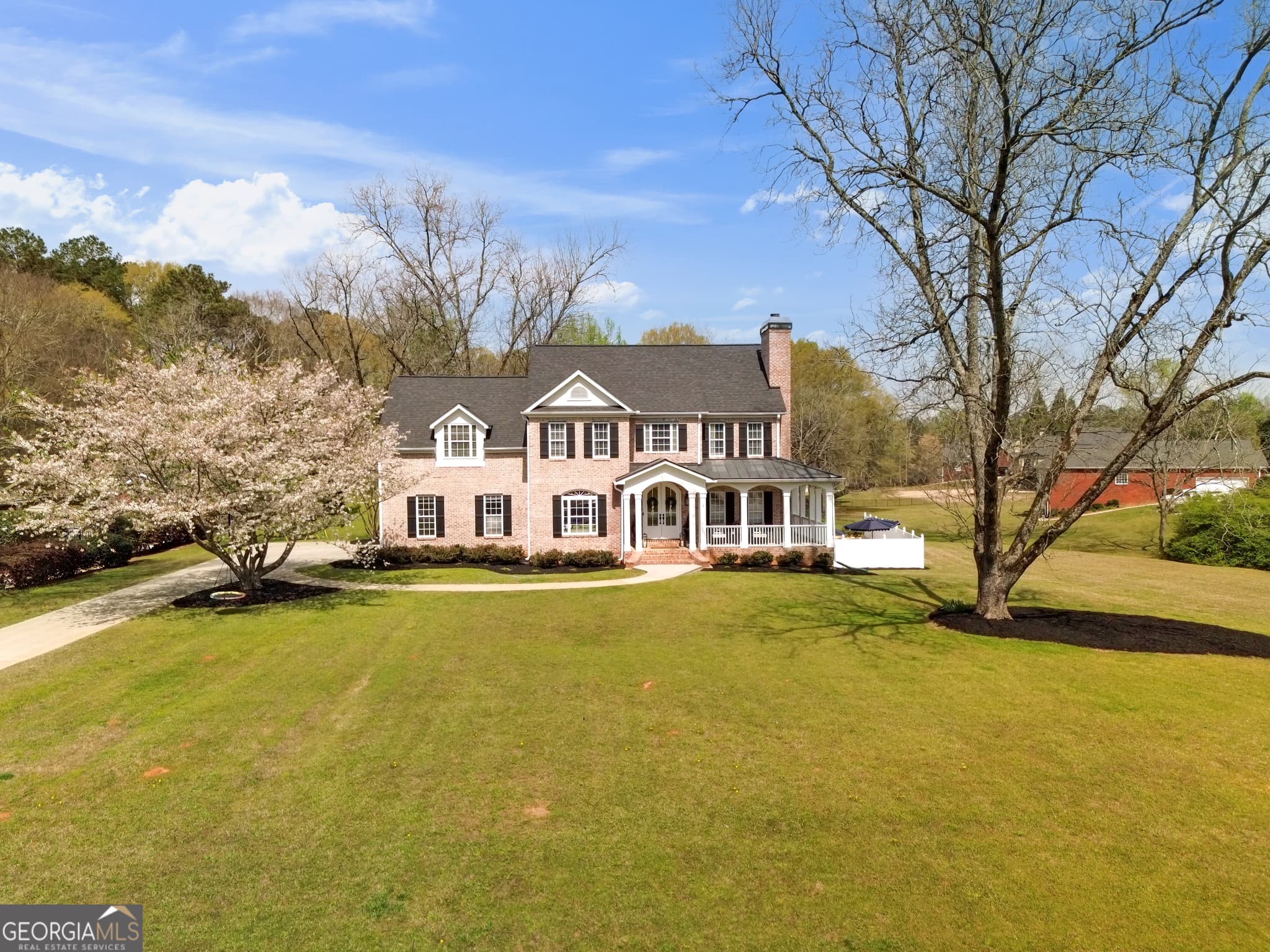 6 bedroom, 5 bathroom, 4,752 sq ft single family residence for sale at 120 Lake Park Drive, Sharpsburg, GA 30277