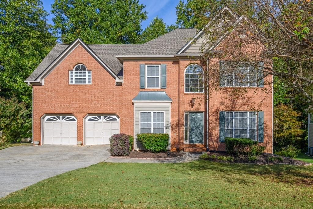 4 bedroom, 3 bathroom, 2,446 sq ft single family residence sold at 2004 Township Drive, Woodstock, GA 30189