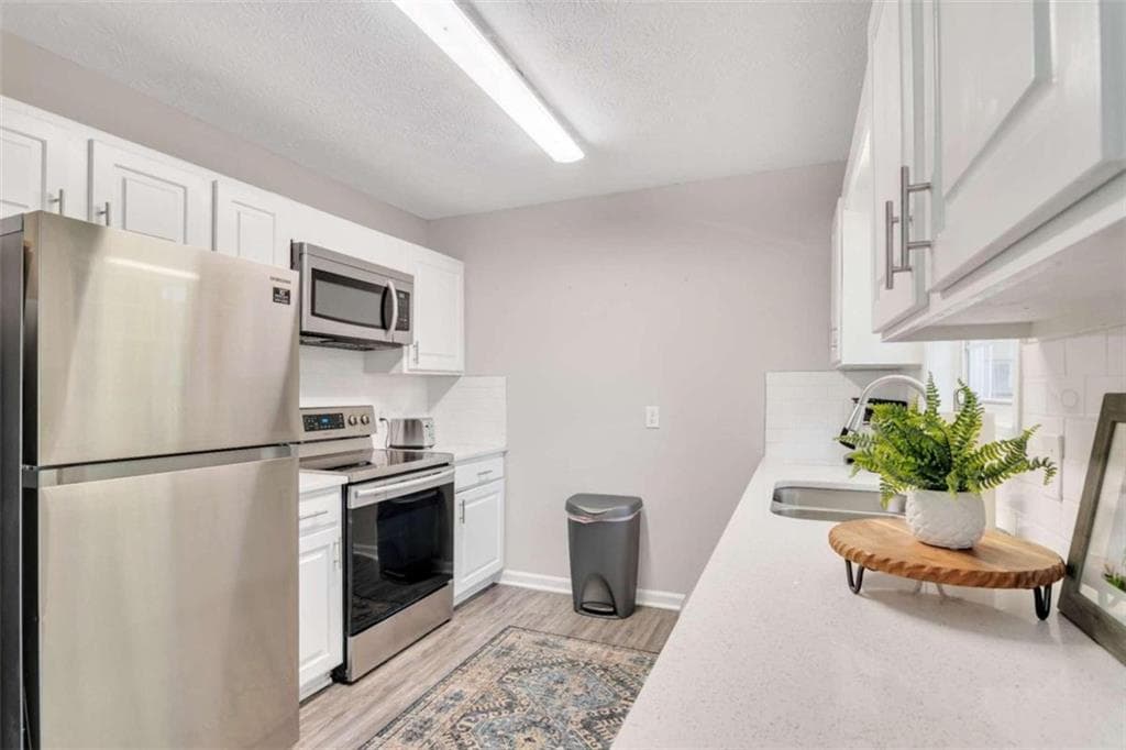 3 bedroom, 2 bathroom single family residence for rent at 302 Hidden Court, Woodstock, GA 30189 for $5,450 a month — photo 7