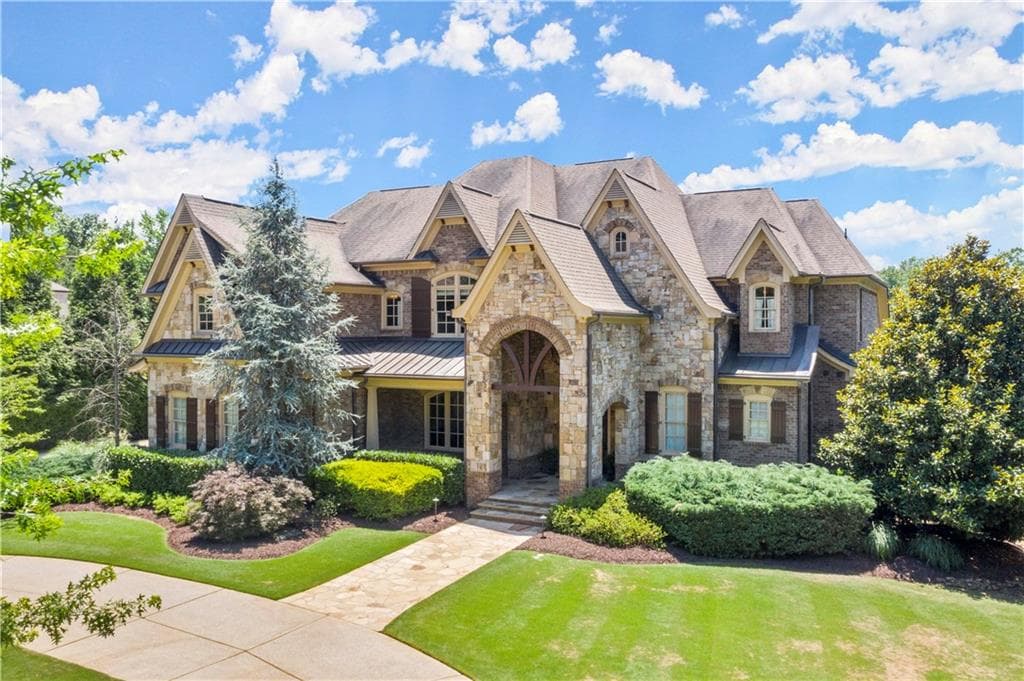 6 bedroom, 8 bathroom, 9,531 sq ft single family residence sold at 3107 Watsons Bend, Milton, GA 30004