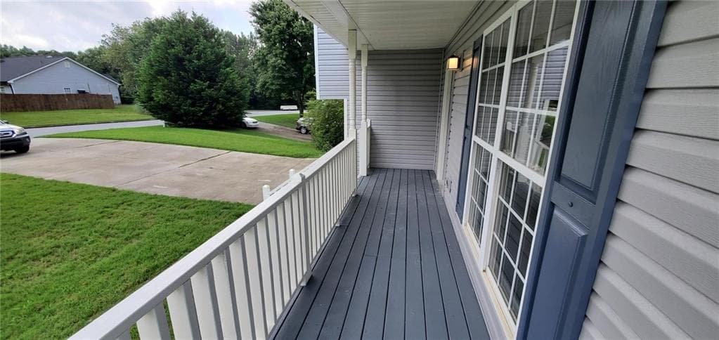 4 bedroom, 3 bathroom, 1,806 sq ft single family residence for sale at 6050 April Drive, Sugar Hill, GA 30518 — photo 2