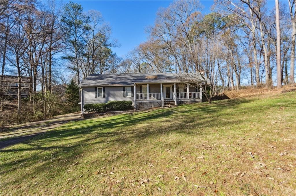4 bedroom, 3 bathroom, 2,303 sq ft single family residence sold at 3673 Ebenezer Road, Marietta, GA 30066