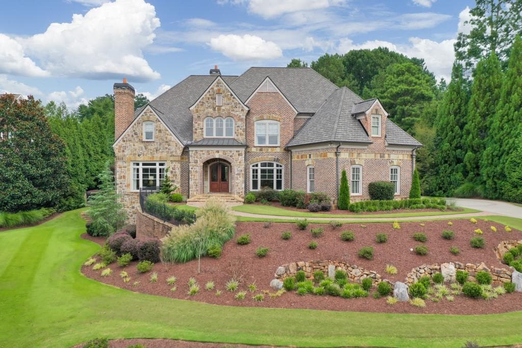 7 bedroom, 9 bathroom, 10,582 sq ft single family residence sold at 3104 Watsons Bend, Milton, GA 30004