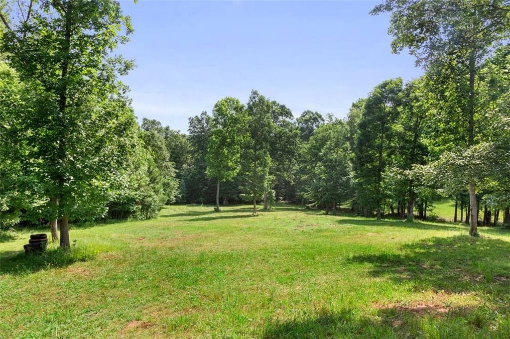 4 bedroom, 3 bathroom single family residence under contract at 3143 DEMOONEY Road, College Park, GA 30349 — photo 4