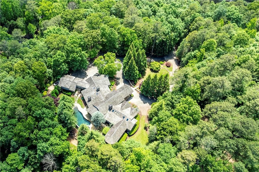 5 bedroom, 7 bathroom, 8,225 sq ft single family residence sold at 11025 Parsons Road, Johns Creek, GA 30097