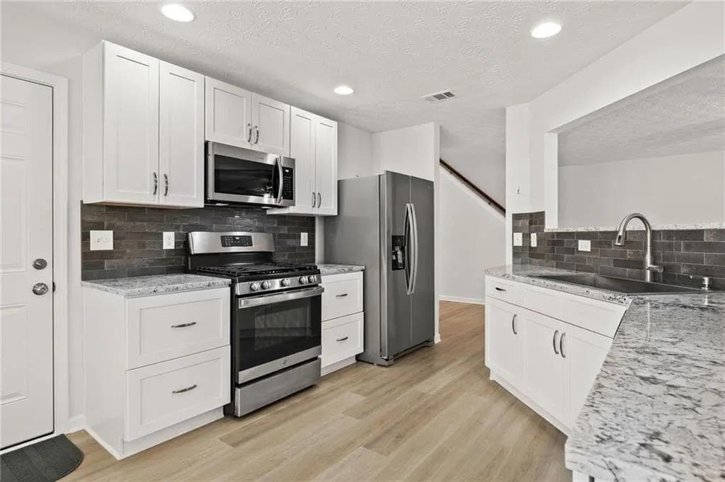 3 bedroom, 3 bathroom, 1,680 sq ft single family residence for rent at 173 Village Trace, Woodstock, GA 30188 for $2,300 a month — photo 9