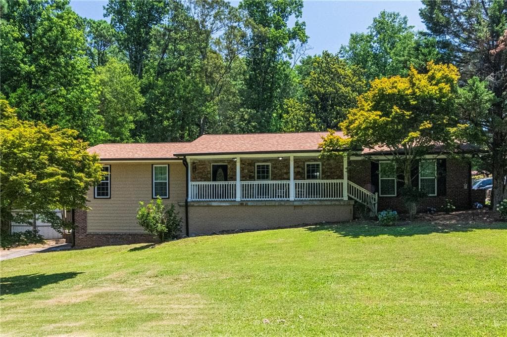 4 bedroom, 3 bathroom single family residence sold at 1447 Gardner Road, Conyers, GA 30012