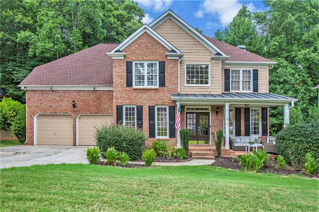 6 bedroom, 5 bathroom, 4,960 sq ft single family residence sold at 707 E Green Lane, Woodstock, GA 30189