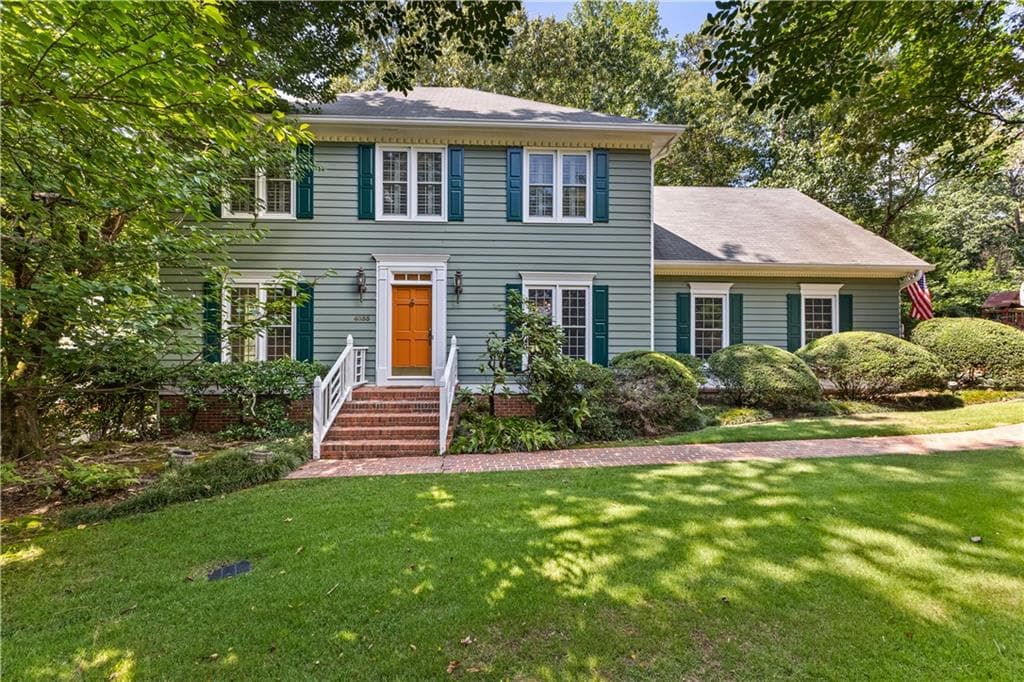 4 bedroom, 3 bathroom, 3,075 sq ft single family residence sold at 4055 Dunwoody Club Drive, Atlanta, GA 30350