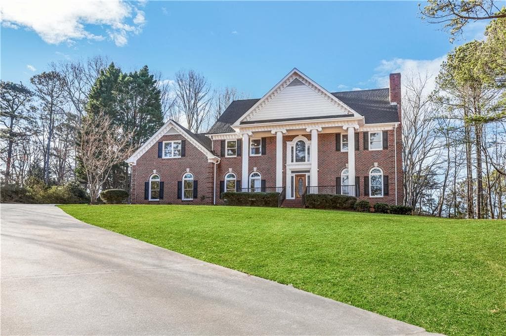 6 bedroom, 6 bathroom, 6,337 sq ft single family residence sold at 1889 E Gate Drive, Smoke Rise, GA 30087