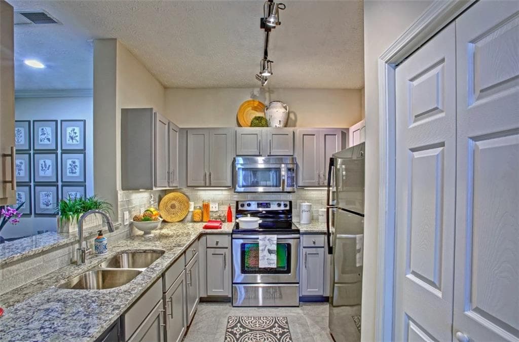 1 bedroom, 1 bathroom, 723 sq ft apartment for rent at 240 E Belle Isle Road 152, Atlanta, GA 30342 for $1,324 a month — photo 1 of 21