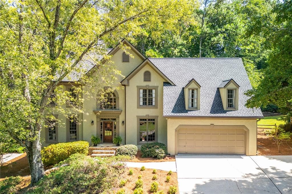 5 bedroom, 4 bathroom, 4,110 sq ft single family residence sold at 11005 Wilshire Chase Drive, Johns Creek, GA 30097
