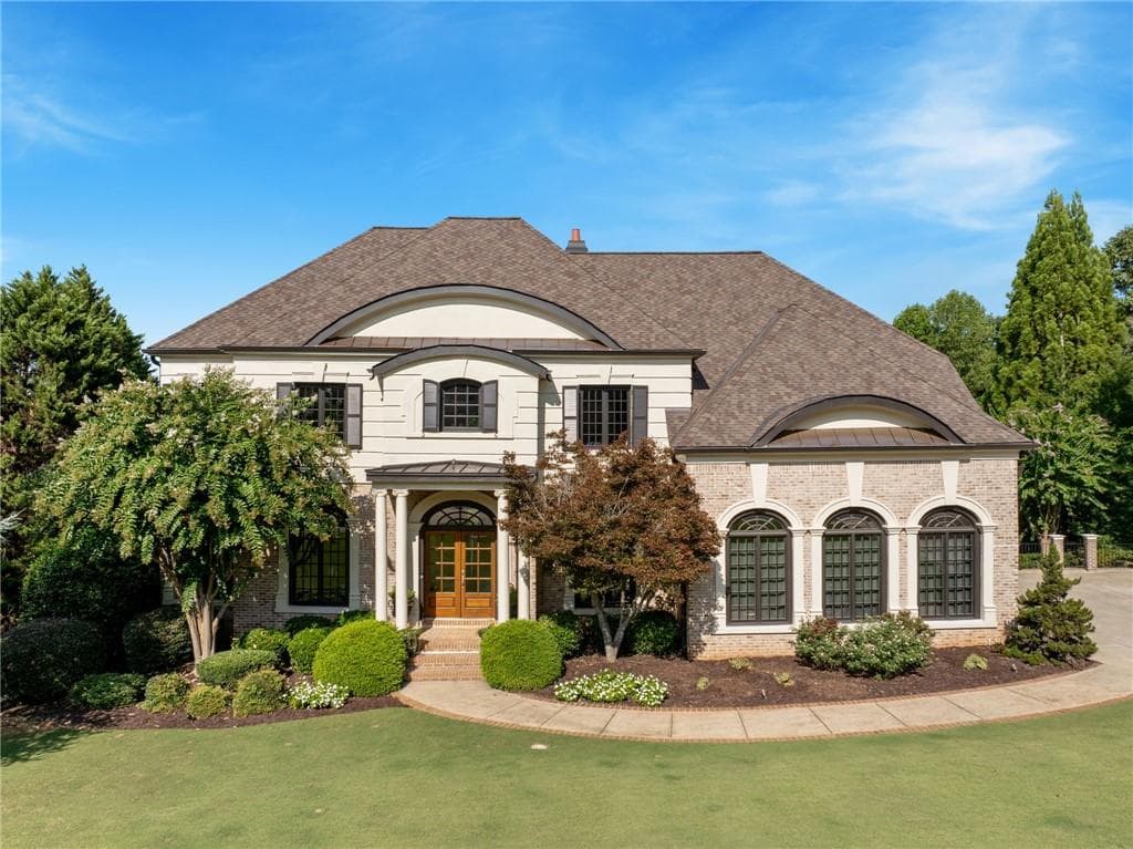 6 bedroom, 7 bathroom, 7,137 sq ft single family residence sold at 136 Cedar Woods Trail, Canton, GA 30114