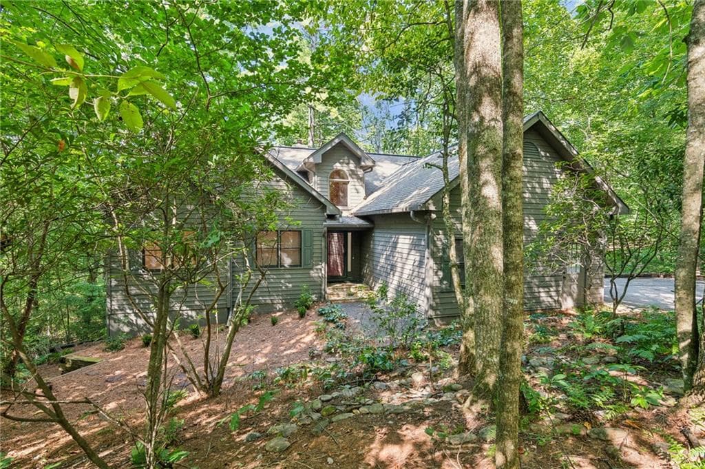 4 bedroom, 3 bathroom single family residence sold at 28 Royal Fern Trail, Big Canoe, GA 30143