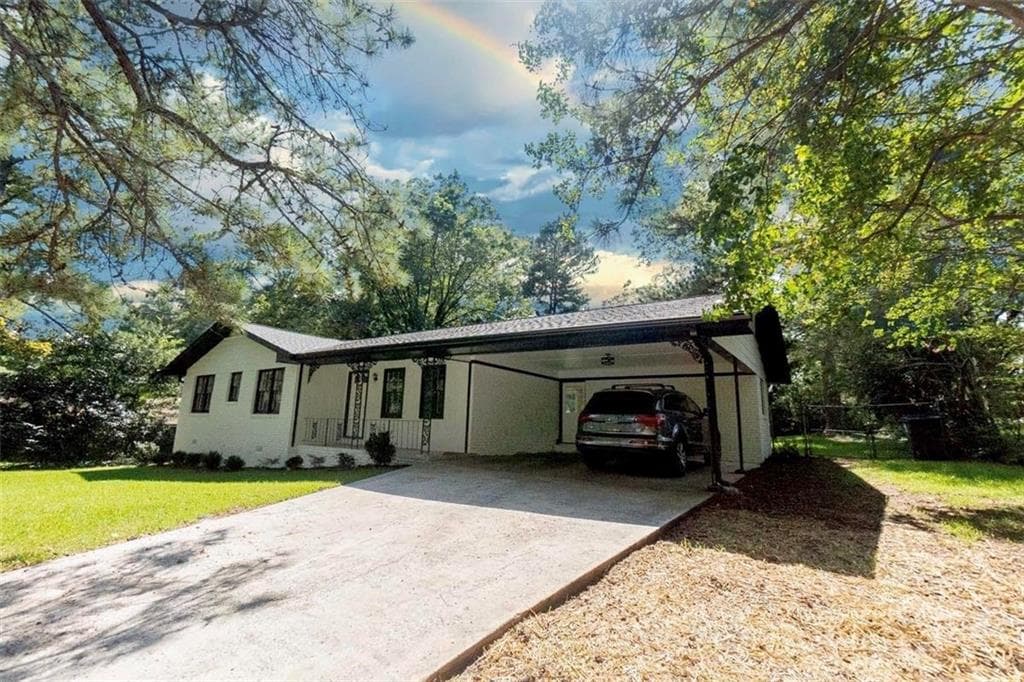 4 bedroom, 3 bathroom single family residence sold at 6733 Walker Road, Riverdale, GA 30296