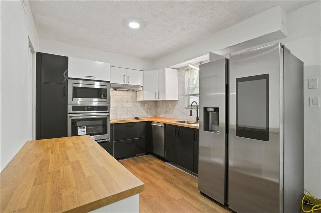3 bedroom, 2 bathroom, 1,237 sq ft condominium for sale at 6584 Sleepy Hollow Lane, Morrow, GA 30260 — photo 2