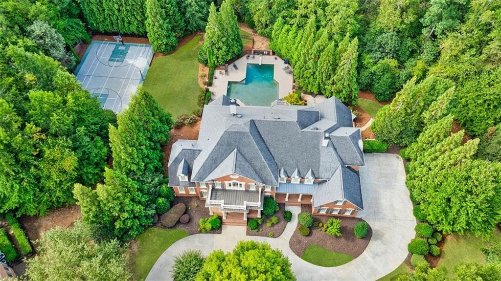 7 bedroom, 9 bathroom, 10,642 sq ft single family residence sold at 2200 Lockett Court, Duluth, GA 30097