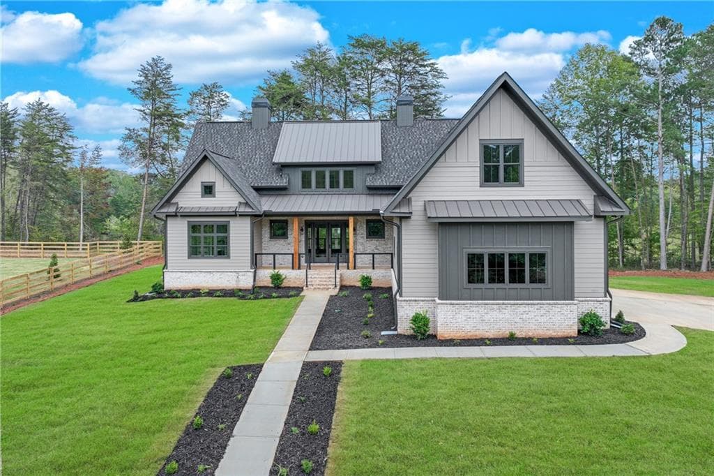 4 bedroom, 4 bathroom, 3,918 sq ft single family residence sold at 6106 BLUEWATER Boulevard, Gainesville, GA 30506