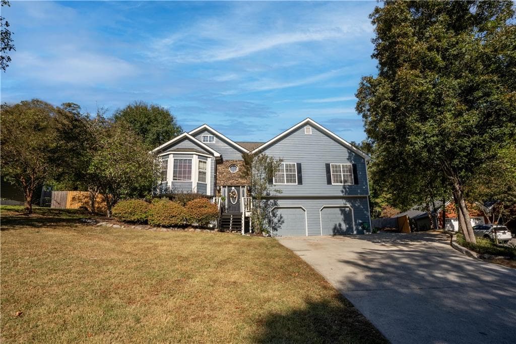 5 bedroom, 4 bathroom single family residence sold at 6225 Ivy Springs Drive, Flowery Branch, GA 30542