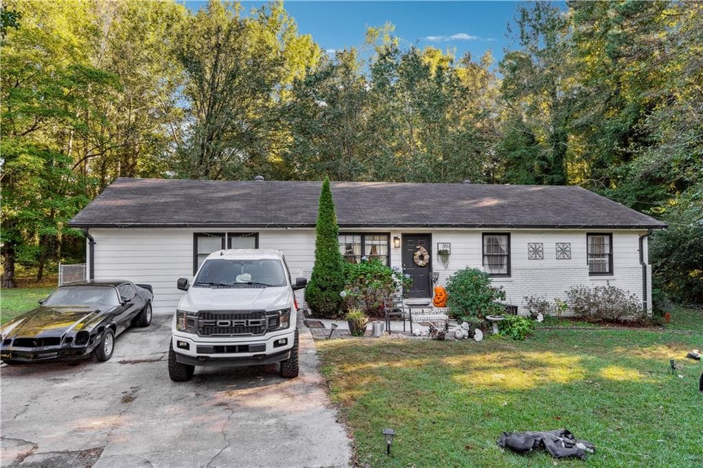 4 bedroom, 3 bathroom single family residence sold at 386 Black Oak Court, Lawrenceville, GA 30046