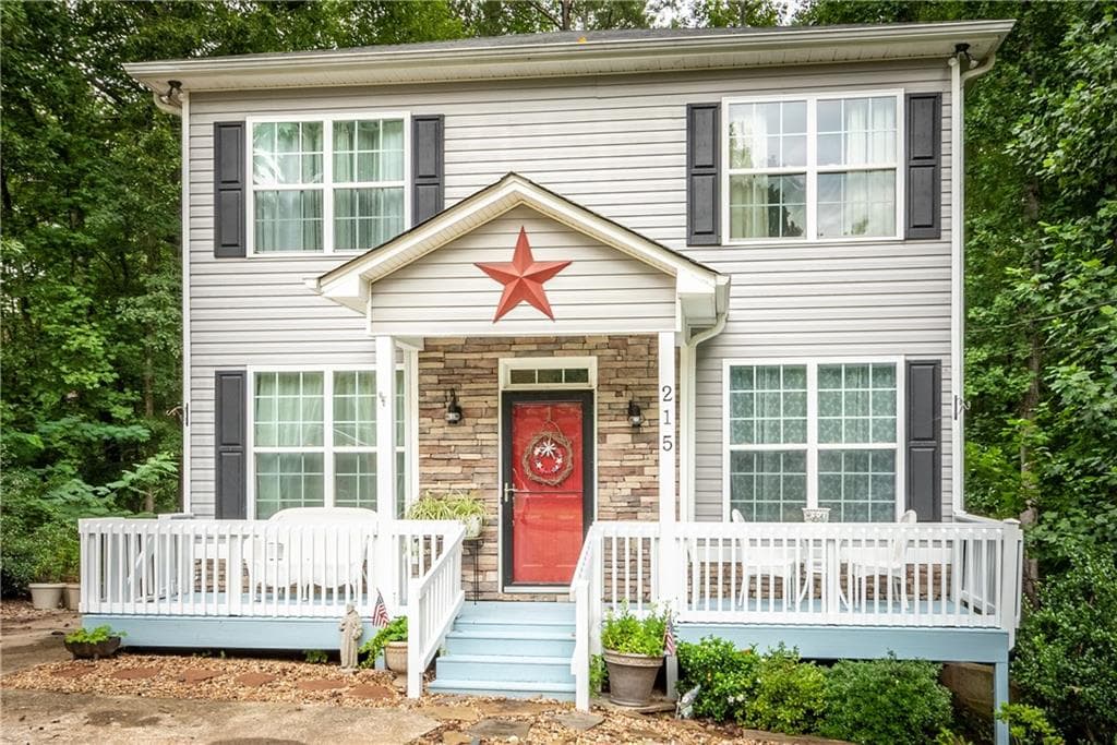 4 bedroom, 4 bathroom, 1,980 sq ft single family residence sold at 215 Cherokee Village Drive, Ball Ground, GA 30107