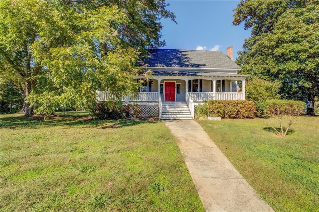 3 bedroom, 2 bathroom single family residence sold at 38 S Broad Street, Porterdale, GA 30014