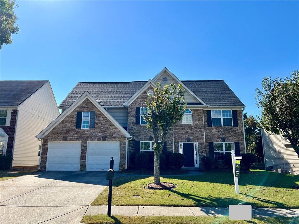 5 bedroom, 3 bathroom, 2,740 sq ft single family residence sold at 749 Roxholly Lane, Buford, GA 30518