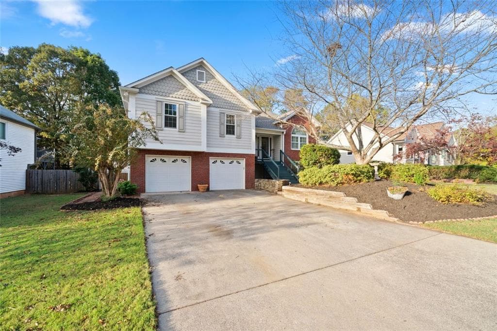 5 bedroom, 4 bathroom, 2,335 sq ft single family residence sold at 5006 SPICE GARDEN Lane, Woodstock, GA 30189