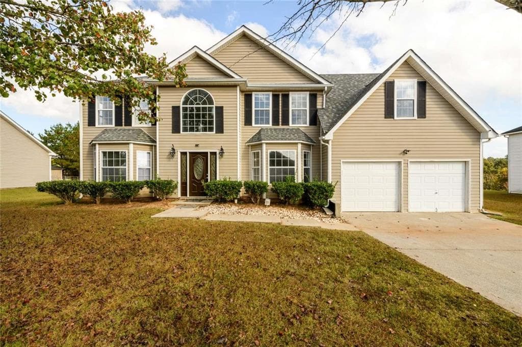 5 bedroom, 3 bathroom single family residence sold at 690 Lakewater View Lane, Stone Mountain, GA 30087