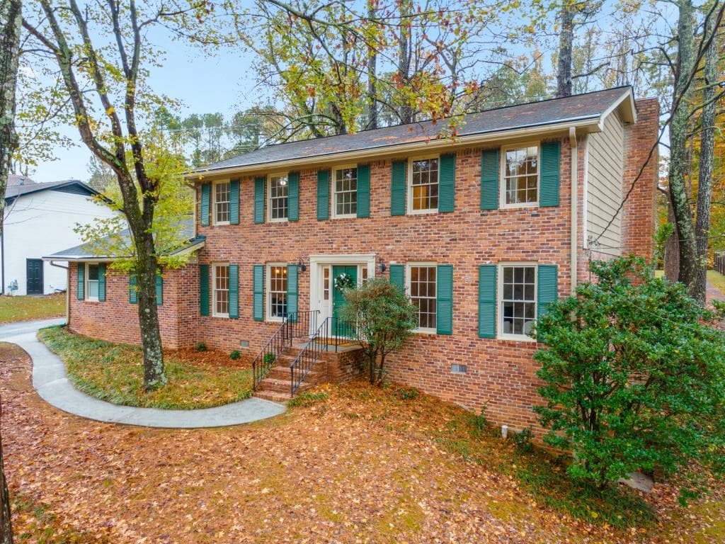 4 bedroom, 3 bathroom single family residence sold at 1301 Witham Drive, Dunwoody, GA 30338