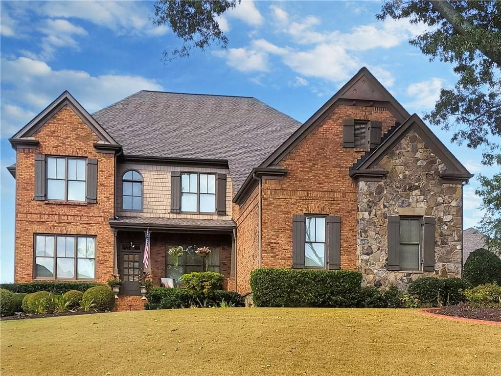 5 bedroom, 4 bathroom, 4,741 sq ft single family residence sold at 1039 Woodtrace Lane, Auburn, GA 30011