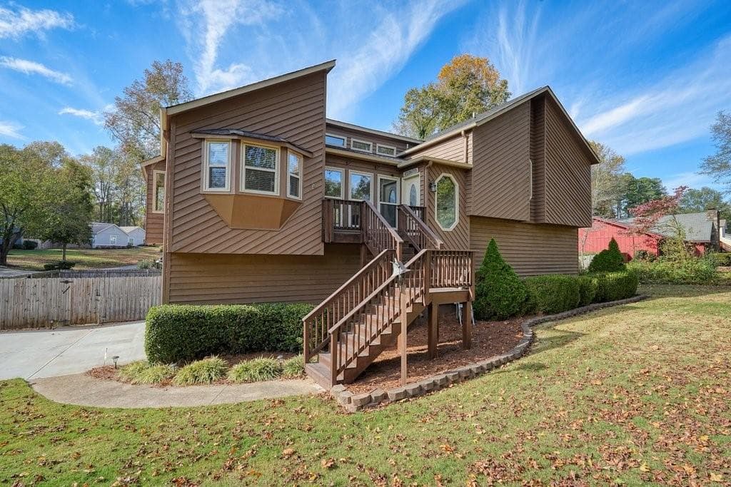 4 bedroom, 3 bathroom single family residence sold at 4445 Hollister Drive, Roswell, GA 30075