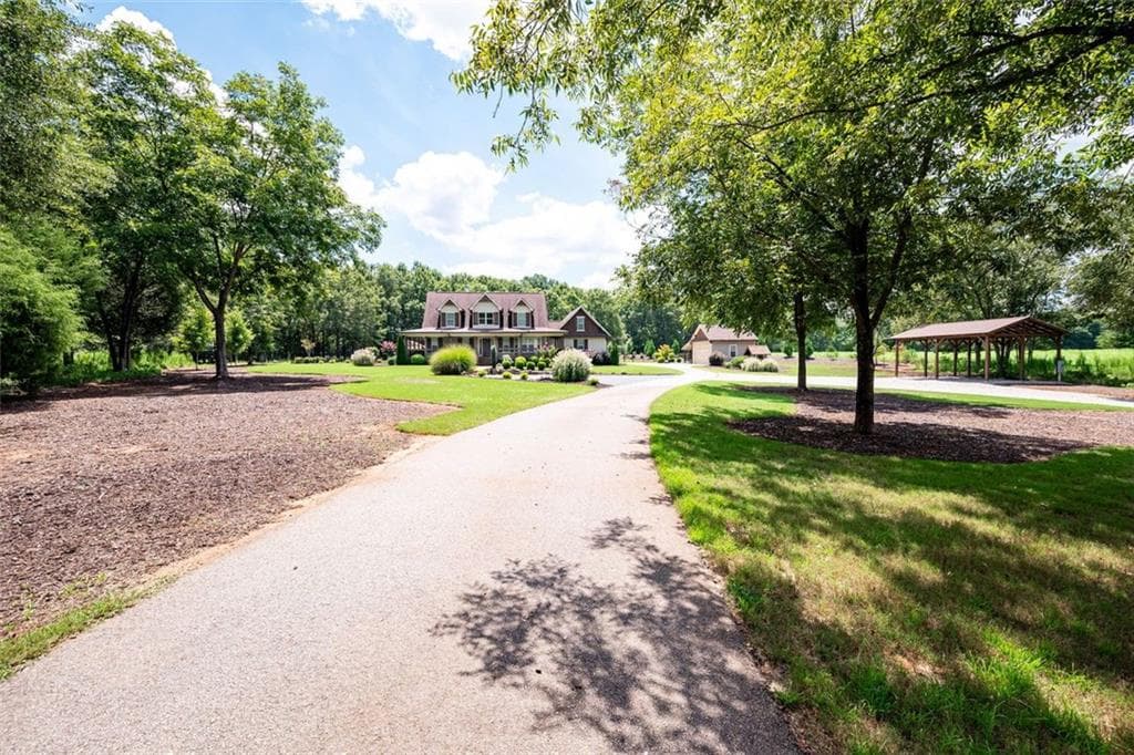 5 bedroom, 4 bathroom single family residence sold at 2299 Marion Ivie Road, Good Hope, GA 30641