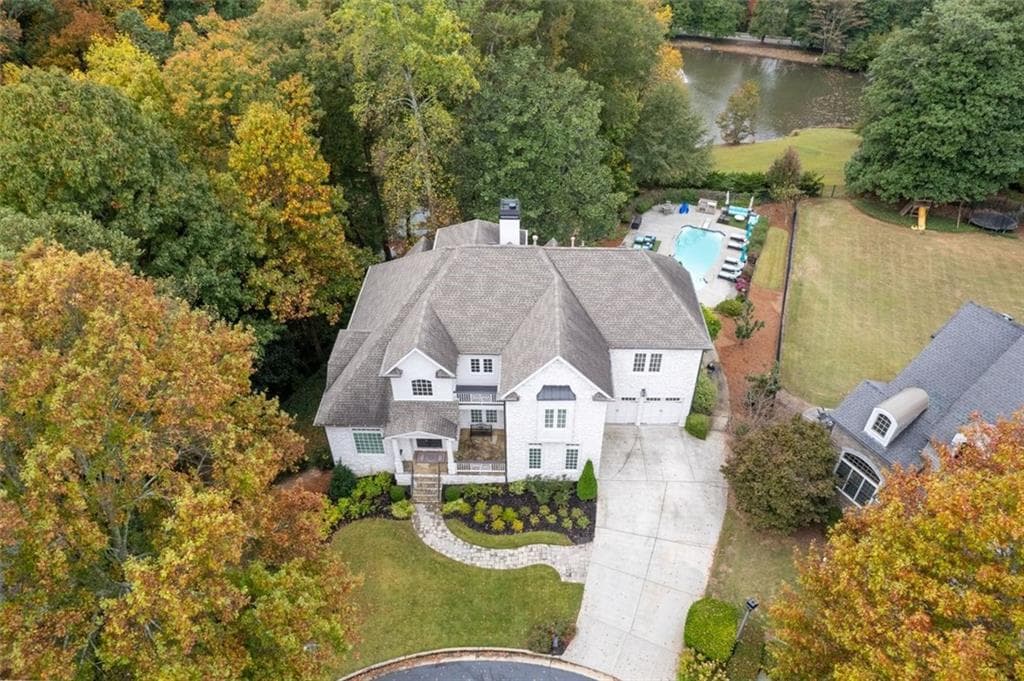 5 bedroom, 6 bathroom, 6,382 sq ft single family residence sold at 795 LAKE SUMMIT Drive, Atlanta, GA 30342