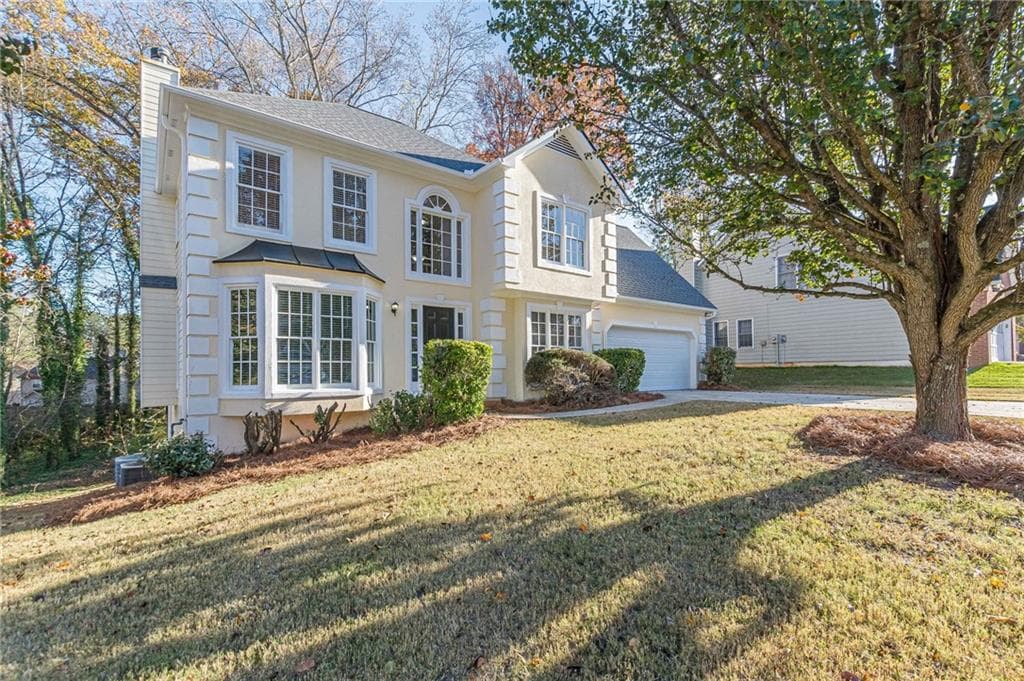 4 bedroom, 3 bathroom single family residence sold at 2310 Compton Place, Suwanee, GA 30024