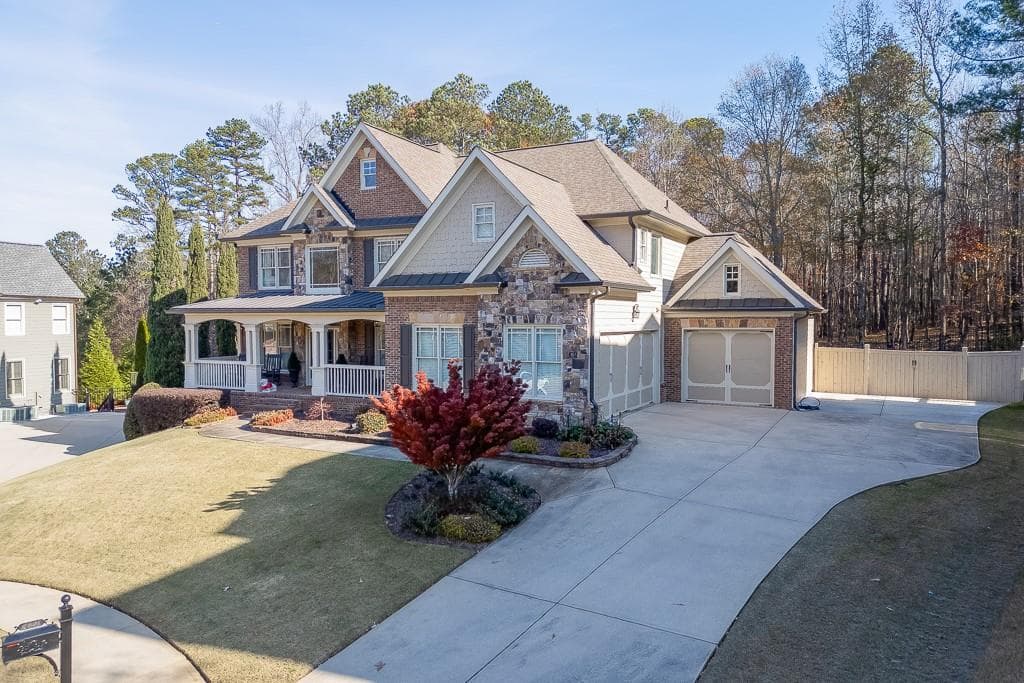 6 bedroom, 5 bathroom, 5,190 sq ft single family residence sold at 4821 Moon Chase Drive, Buford, GA 30519