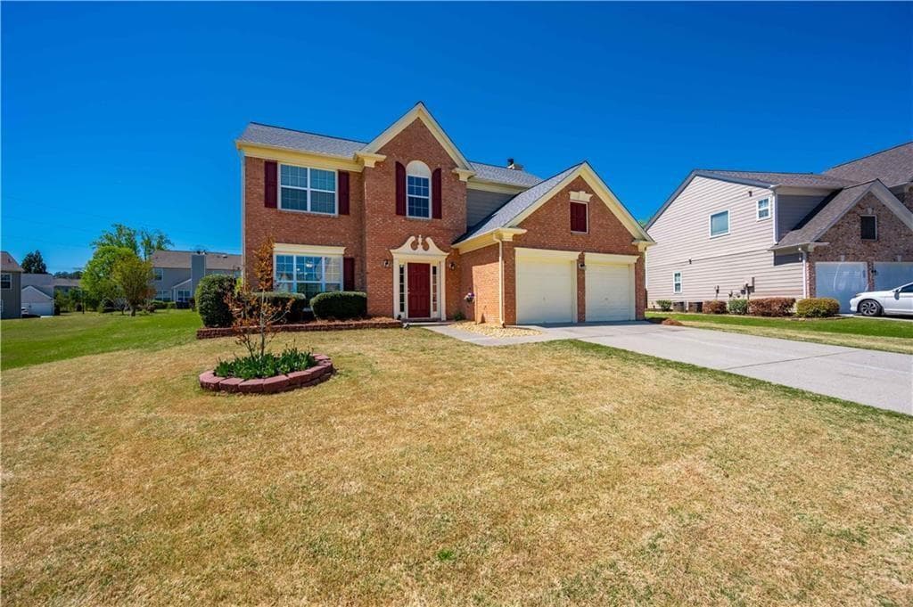 4 bedroom, 3 bathroom, 2,300 sq ft single family residence sold at 8115 Lockslay Way, Suwanee, GA 30024