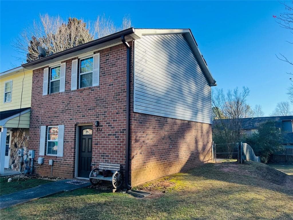 2 bedroom, 2 bathroom, 1,144 sq ft townhouse for sale at 2711 Greystone Court, Austell, GA 30106 — photo 1 of 20