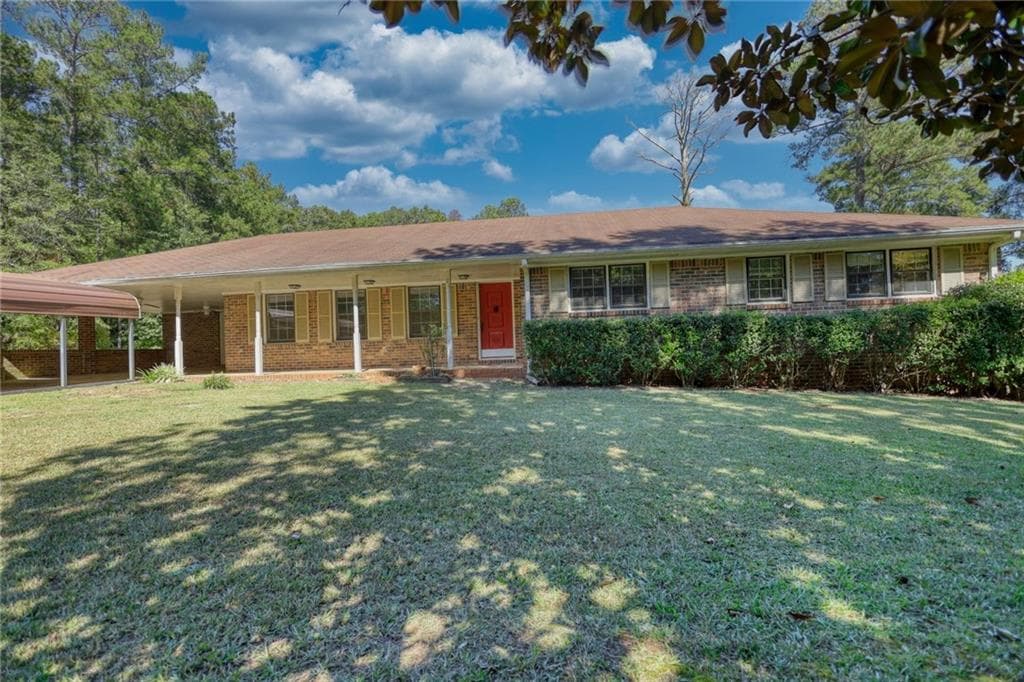 4 bedroom, 2 bathroom single family residence sold at 11790 Brown Bridge Road, Covington, GA 30016