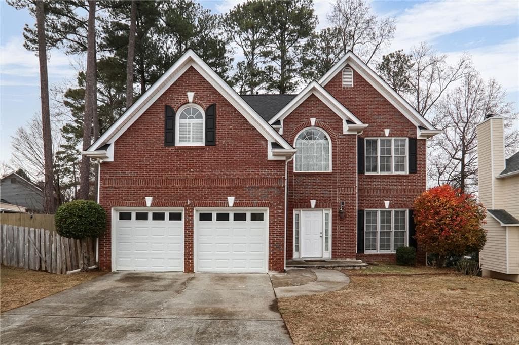 4 bedroom, 3 bathroom, 2,307 sq ft single family residence for sale at 1547 Welch Court, Suwanee, GA 30024