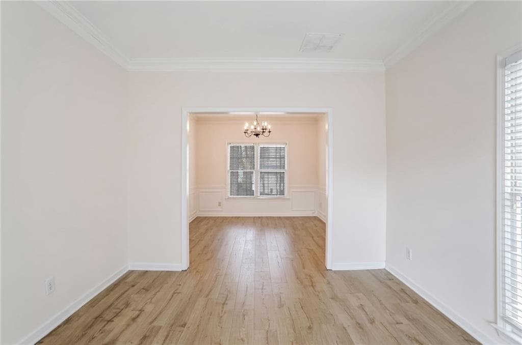 4 bedroom, 3 bathroom, 2,307 sq ft single family residence for sale at 1547 Welch Court, Suwanee, GA 30024 — photo 3