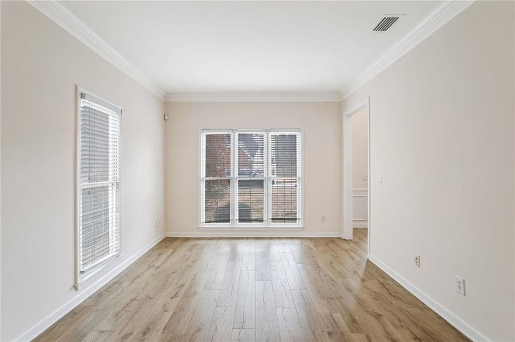 4 bedroom, 3 bathroom, 2,307 sq ft single family residence for sale at 1547 Welch Court, Suwanee, GA 30024 — photo 4